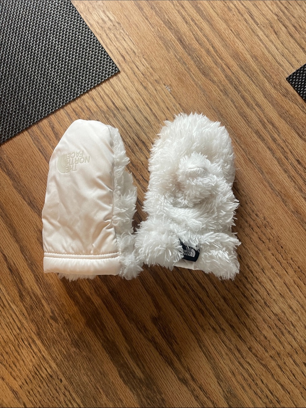 The North Face Kids Cream Fuzzy Mittens.